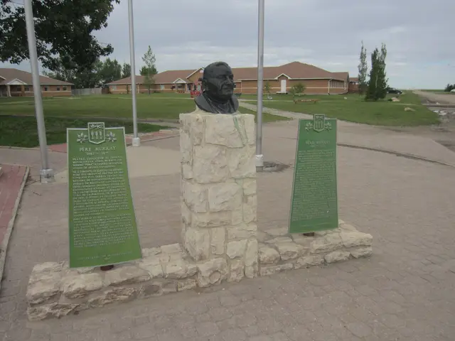 Père Murray memorial bust and plaques at Notre Dame College
